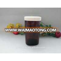 Wholsale amber wine glass bottle candle holder with wooden lid